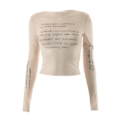 Langärmliges, durchsichtiges Crop-Top aus transparentem Netzstoff mit Kontrastdruck 