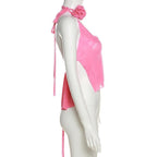 Top corto in rete trasparente con applicazione floreale, scollo a V, volant e schiena scoperta