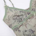 Top corto con scollo a V e orlo in pizzo con stampa floreale in rete trasparente 