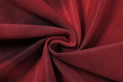 Ärmelloses Midikleid aus transparentem Netzstoff mit Kontrastdruck und Schlitz