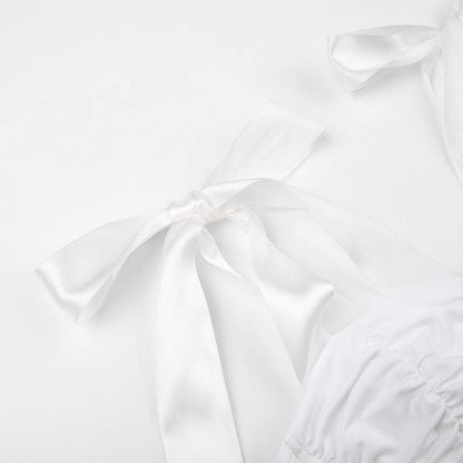 Top scollato e senza schienale con corsetto arricciato e allacciatura automatica