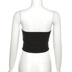 Top a corsetto con scollo a V senza schienale e applicazioni floreali 