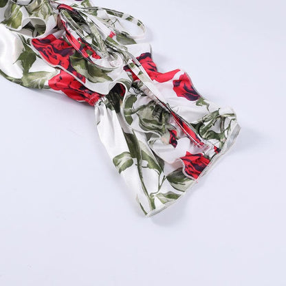 Schulterfreies, kontrastierendes, langärmliges, rückenfreies Minikleid mit Blumenmuster 