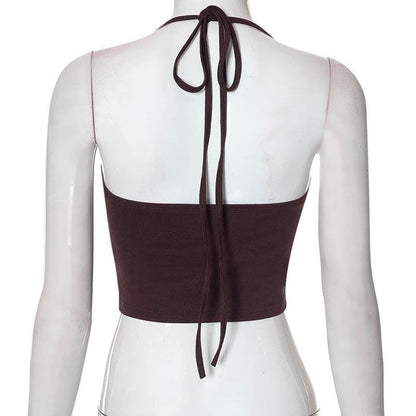 Top corto con schiena scoperta e lacci a contrasto con patchwork 