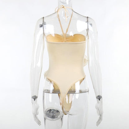 Bodysuit con scollo all'americana, schiena scoperta, arricciato e applicazioni di fiori traforati