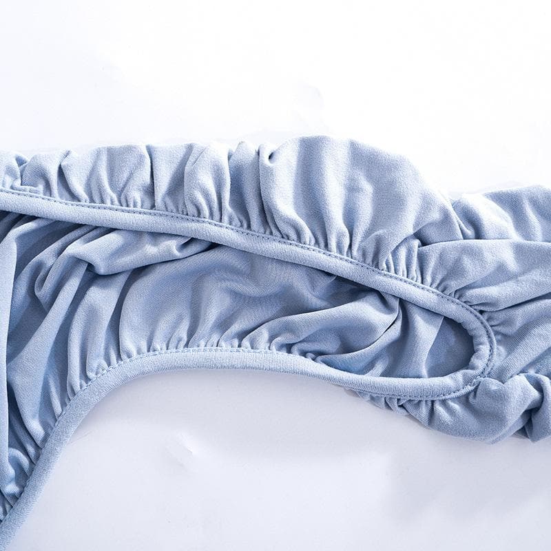 Top corto in due pezzi con collo alto, maniche lunghe e arricciate 