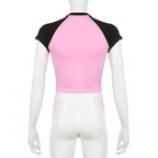 Top corto a maniche corte con scollo rotondo e patchwork a contrasto con motivo a stelle 