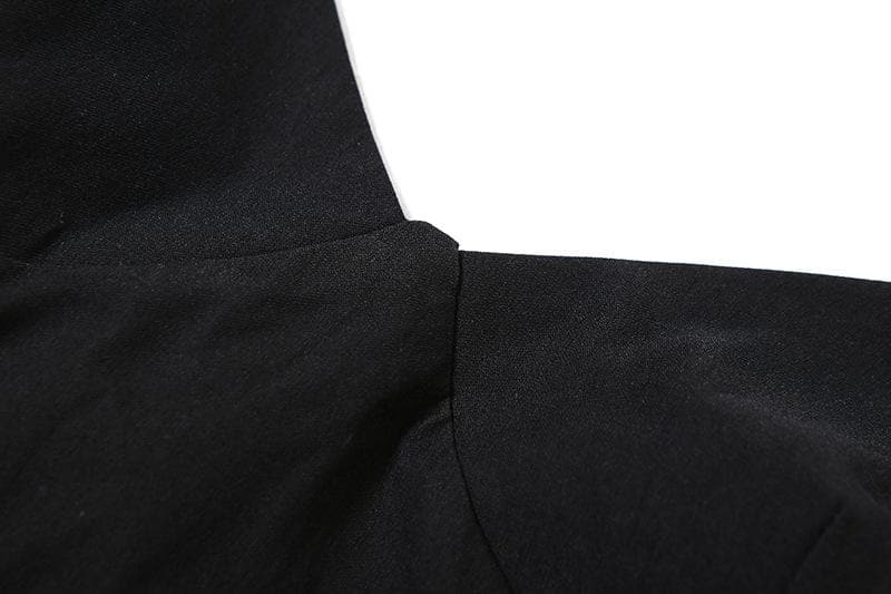 Top a corsetto con scollo a V senza schienale e applicazioni floreali 
