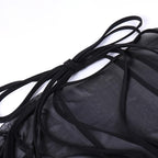 Top corto con corsetto in rete traforata e maniche lunghe - Saldi finali 