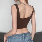 Top corto senza maniche con scollo a V, coulisse e orlo in pizzo 
