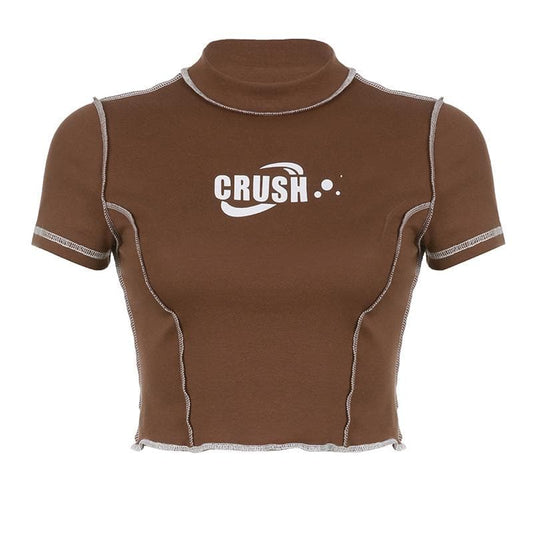 Top corto con volant a maniche corte e motivo "CRUSH" a contrasto di cuciture 