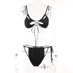 Completo pantaloni canotta con lacci e schiena scoperta con incrocio sul davanti