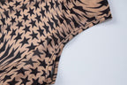 Durchsichtiges Bodysuit-Hosenset aus transparentem Netzstoff mit hohem Halsausschnitt und ärmellosem Sternmuster 