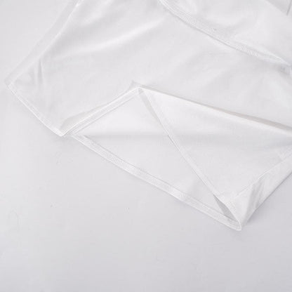 Top in due pezzi con fiocco, senza maniche e schiena scoperta in pizzo