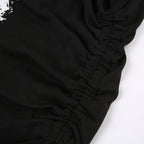 Top corto con scollo a U incrociato sulla schiena e coulisse a contrasto con motivo a farfalla 
