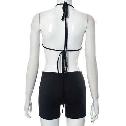 Hollow out solid halter backless self tie romper