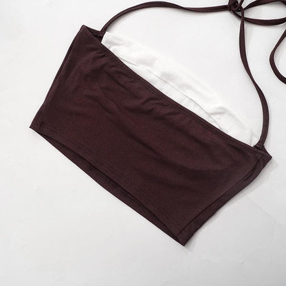 Top corto con schiena scoperta e lacci a contrasto con patchwork 