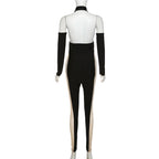 Rückenfreier Jumpsuit mit Neckholder und Netz-Patchwork und Kontrasthandschuhen