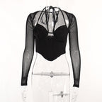 Top corto con corsetto in rete traforata e maniche lunghe - Saldi finali 
