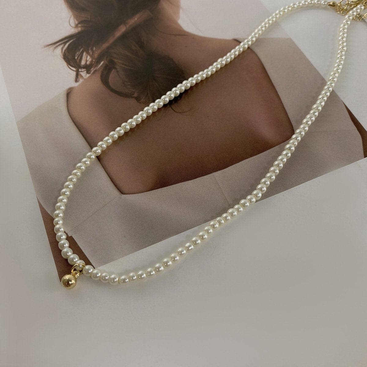 Faux pearl choker necklace