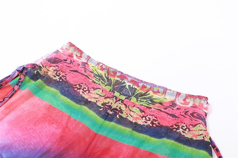 Completo pantaloni a maniche corte con spacchi in rete trasparente e stampa astratta a contrasto