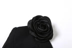 Top a corsetto con scollo a V senza schienale e applicazioni floreali 