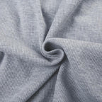 Top corto a maniche corte con applicazione irregolare a patchwork a contrasto con "A" a coste 