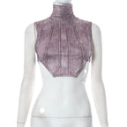 Top corto senza maniche a contrasto con collo alto e tie-dye
