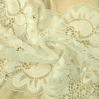 Top corto in pizzo con scollo a V e schiena scoperta, applicazioni floreali a contrasto