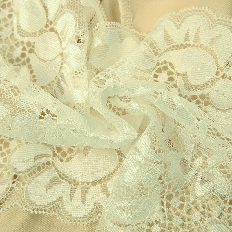 Top corto in pizzo con scollo a V e schiena scoperta, applicazioni floreali a contrasto