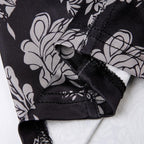 Top corto con scollo a V e schiena scoperta a contrasto in pizzo con stampa floreale 