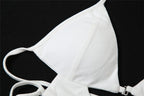 Top corto con scollo a V traforato, schiena scoperta e lacci 