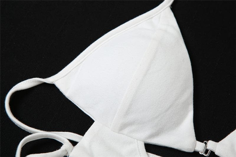 Top corto con scollo a V traforato, schiena scoperta e lacci 