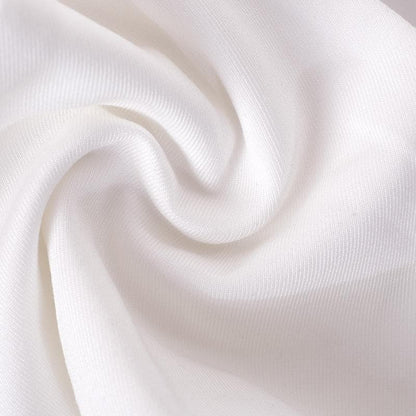 Top corto con laccetti allacciati alla schiena e scollo a V in patchwork di pizzo