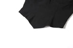 Top a corsetto con scollo a V senza schienale e applicazioni floreali 