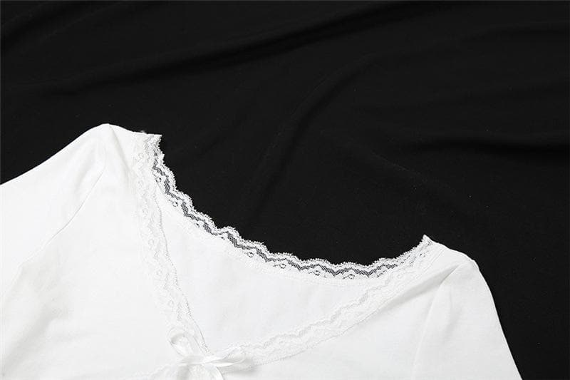 Top corto con fiocco, manica corta e scollo a V, orlo in pizzo 