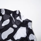 Top a collo alto a contrasto con maniche lunghe e rete trasparente 