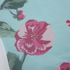Top in rete a contrasto con scollo a V e stampa floreale con orlo in pizzo 