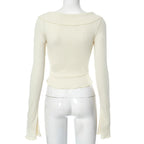 Ribbed flared sleeve heart applique ruffle v neck crop top